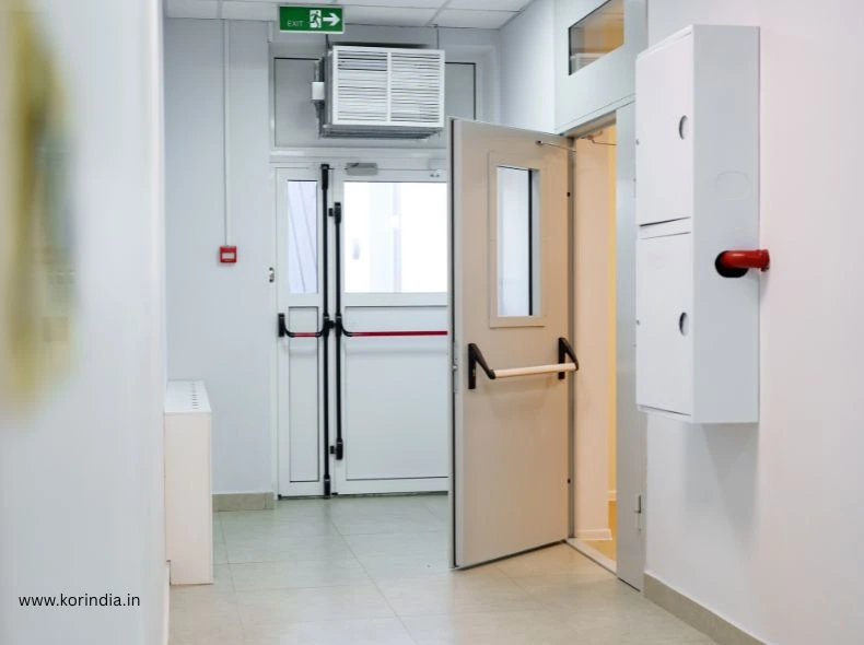 Technical diagram showing fire door components including steel frame, intumescent seals, and 60-120 minute fire resistance ratings